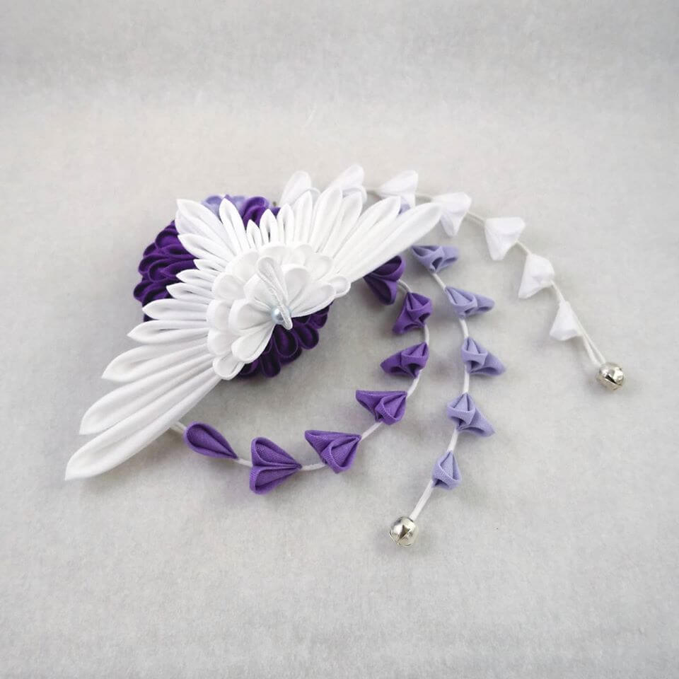 Phoenix with wisteria in purple works really well. 

The gradual change from dark purple to white of the wisteria brings out another dimension to the design.